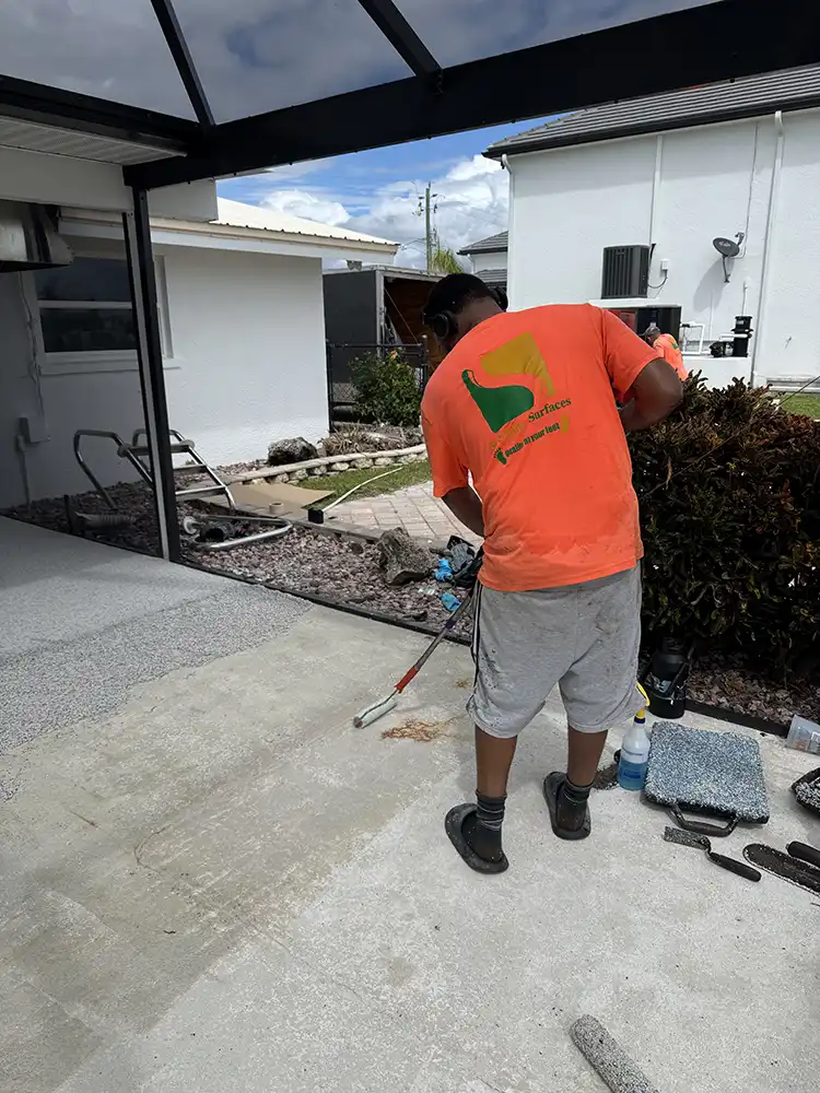 Rolling primer before TPV rubber install Naples